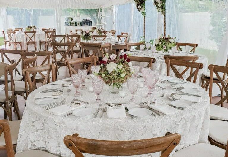 A dining table set up at a wedding