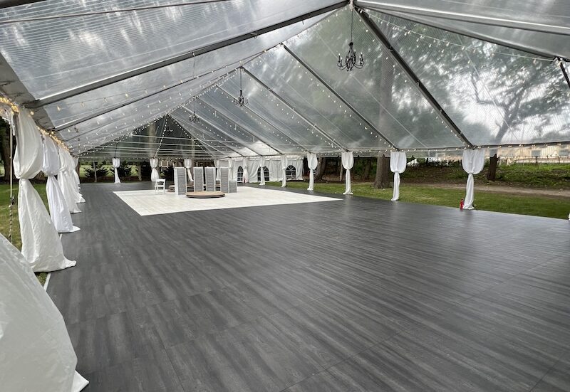 Black-Oak-In-Use-e1715198539155-800x551 a wedding tent, with lights underneath