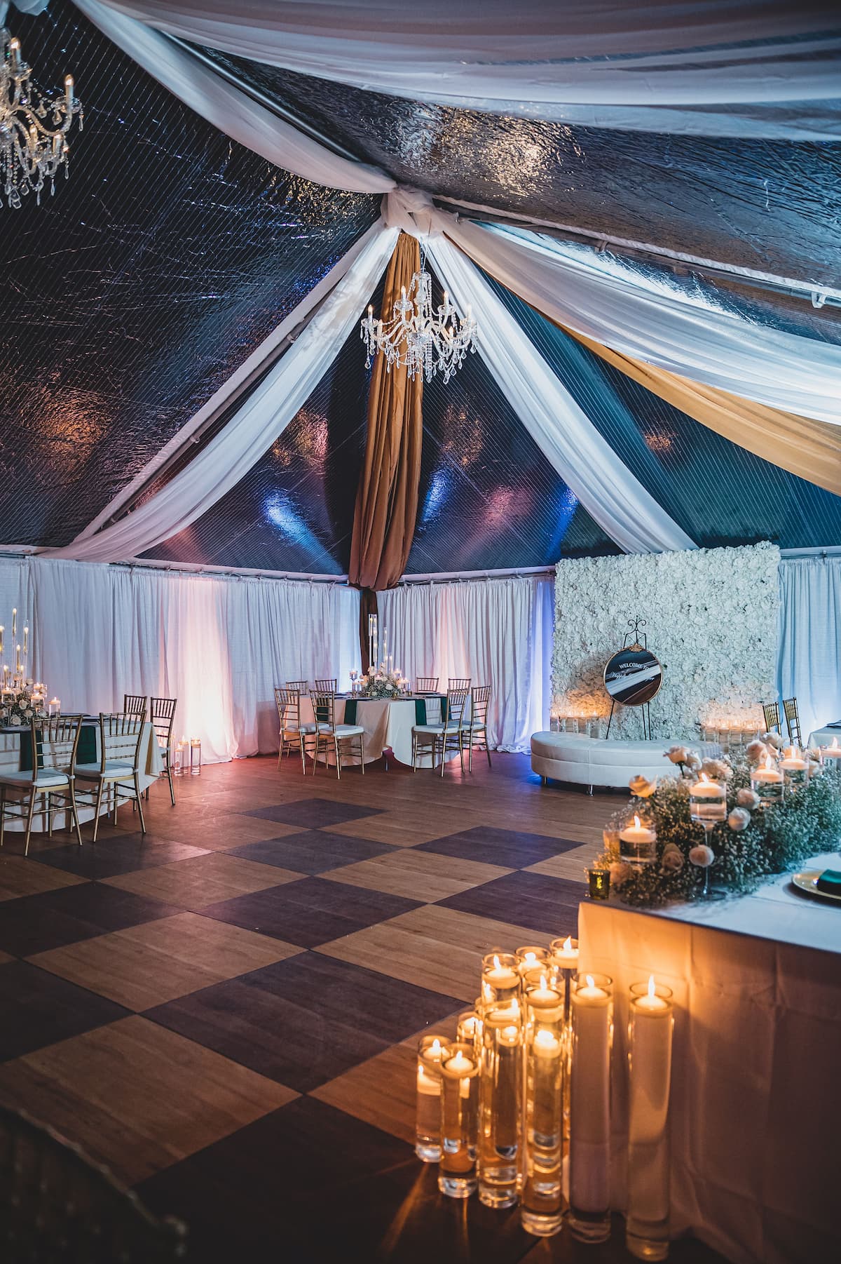 Light-_-Dark-Maple-Checker a wedding tent, with lights underneath